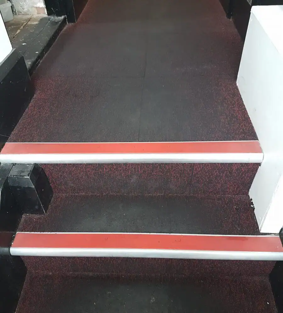 Dirty commercial carpet before professional cleaning